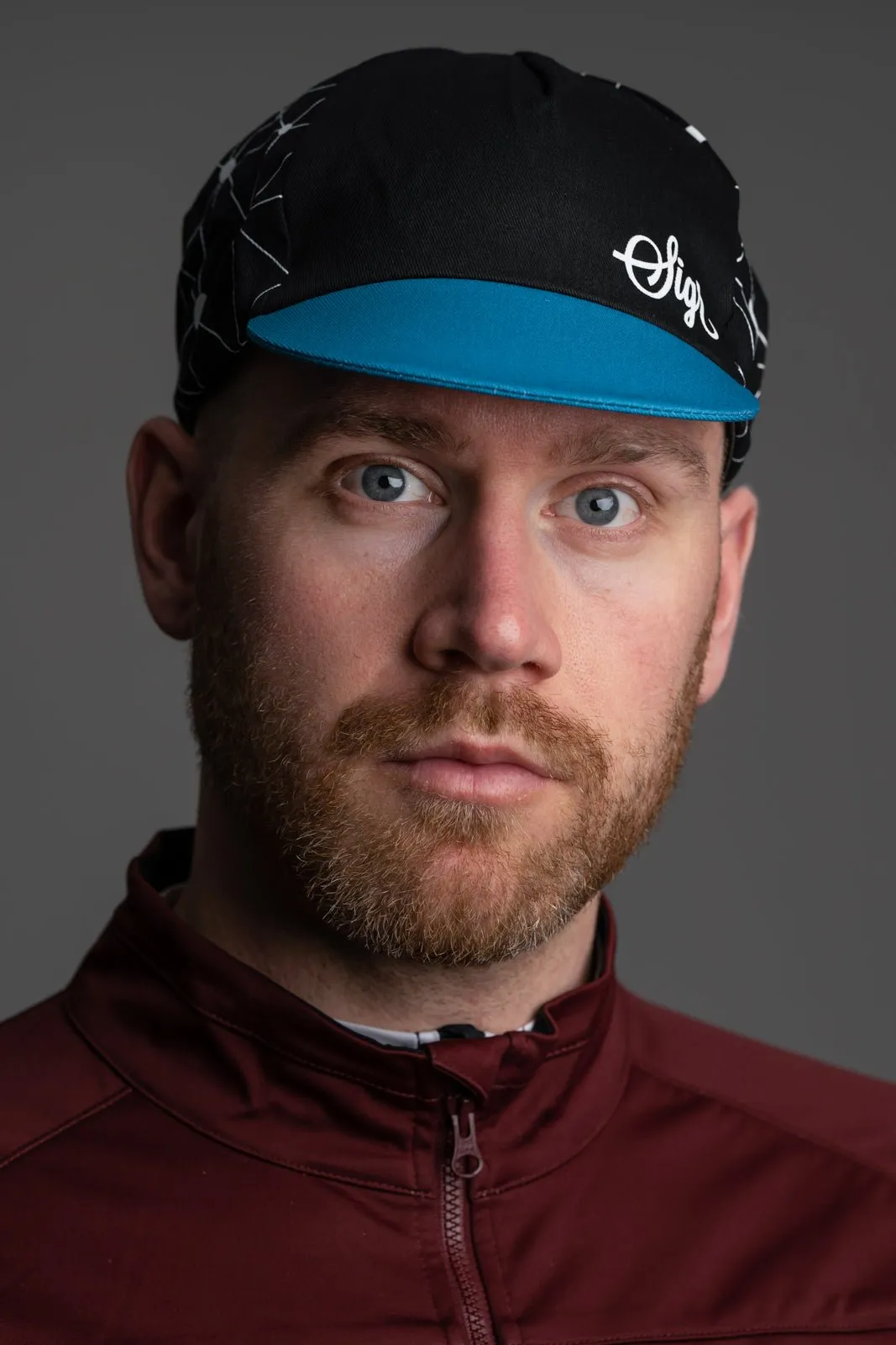 Sidensvans Petrol Blue and Black Cycling Cap