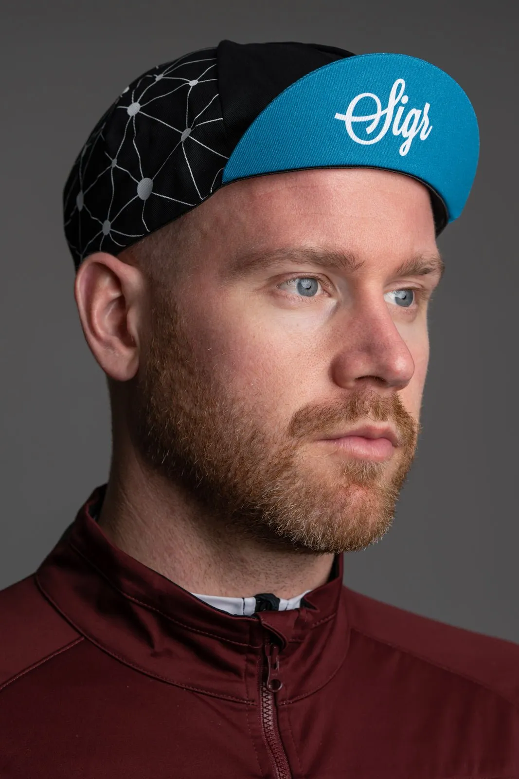 Sidensvans Petrol Blue and Black Cycling Cap