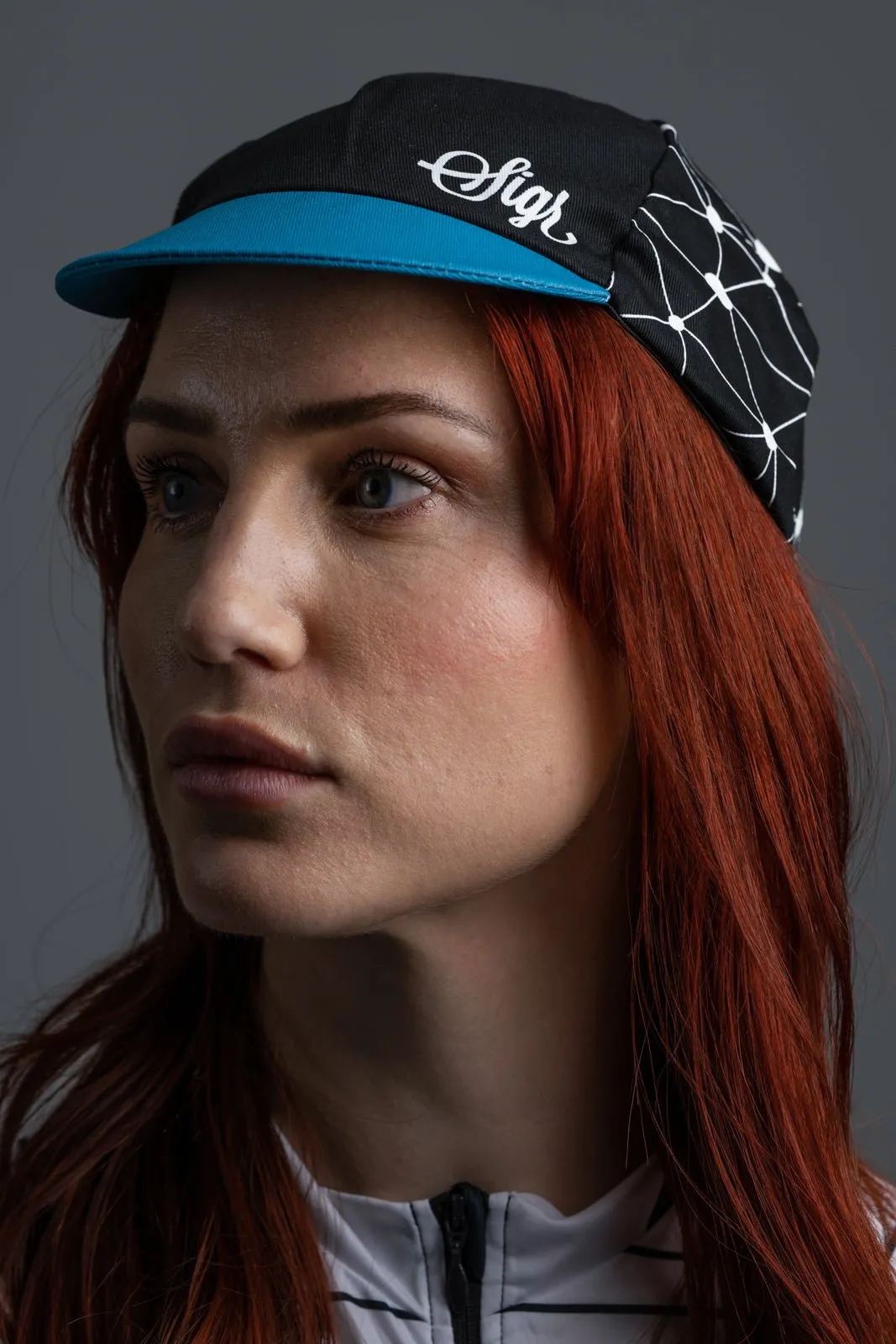 Sidensvans Petrol Blue and Black Cycling Cap